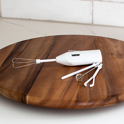 NORPRO<sup>&reg;</sup> Cordless Mini Mixer - This portable, lightweight, and efficient mini mixer can be used at home or on the go.  Includes 4 attachments designed to beat/whip, mix, blend/stir, and froth.  Measures: 4" x 1.5" x 1".  Powered by 2AA batteries (not included).